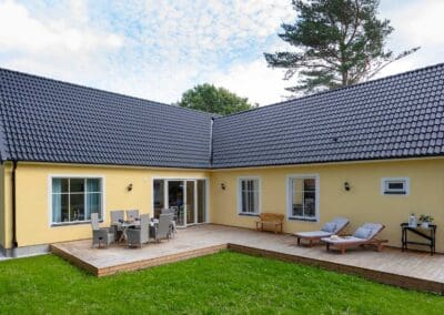 Gult vinkelhus - AChoice stenhus