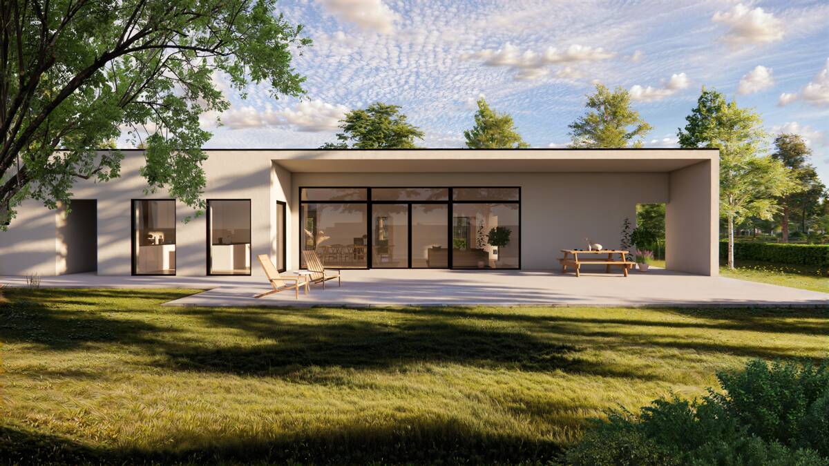Kundunikt arkitektritat hus 1-plan putsad fasad med garage. Bild visar baksida.